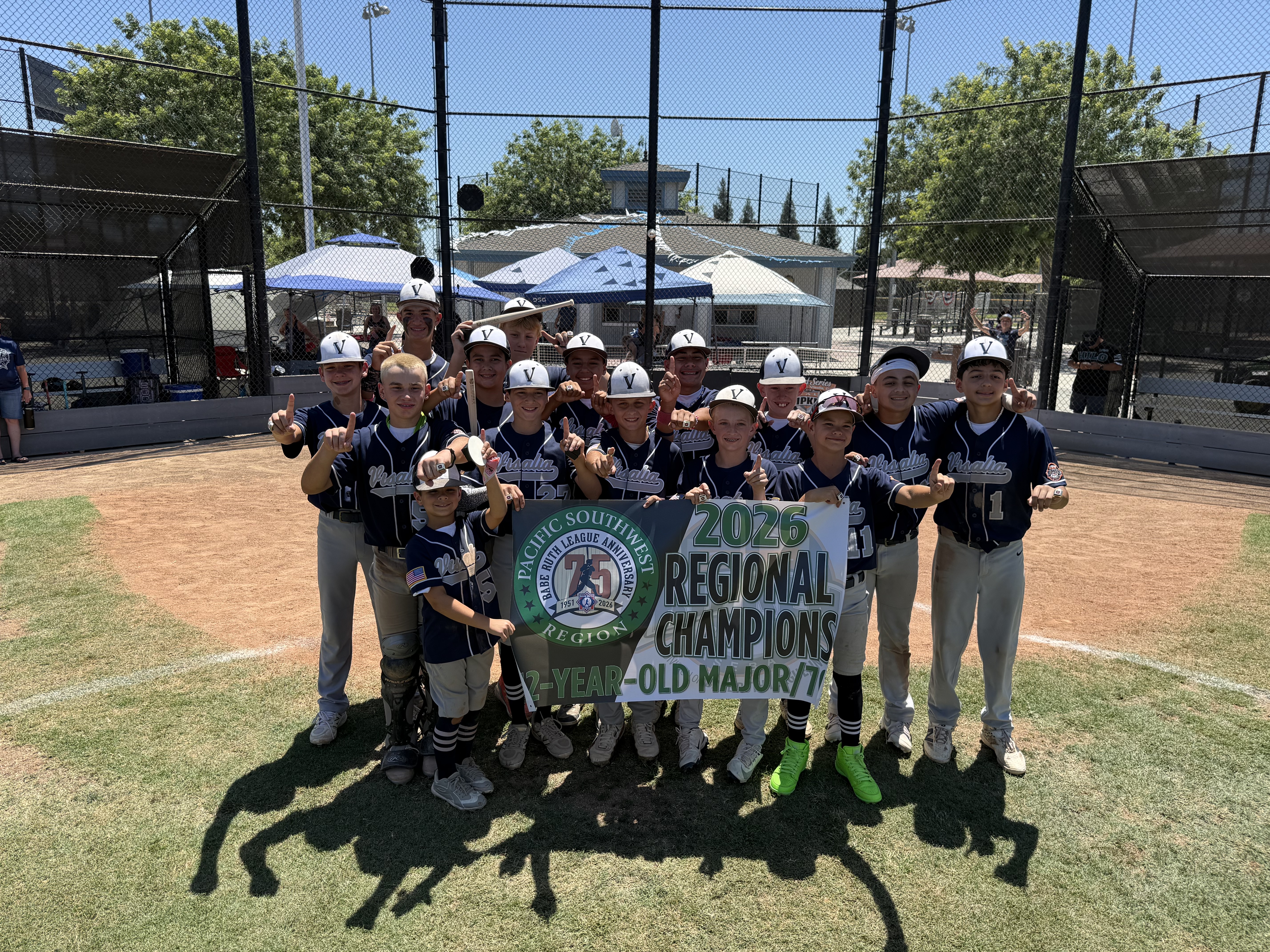 Visalia Blues 12U team celebrating their 2026 Pacific Southwest Regional Championship